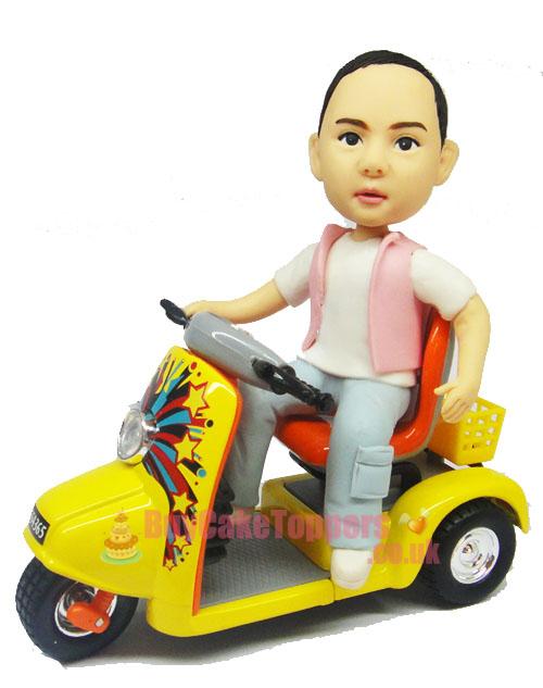kid ride scooter figurine