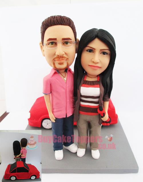 couple and car wedding cake topper